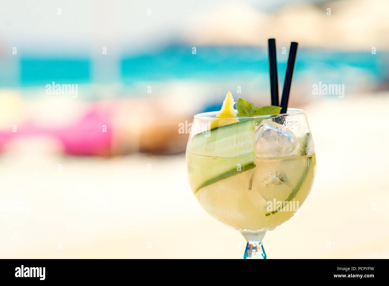 Cucumber drink cocktail, straw hat on wooden table Stock Photo - Alamy