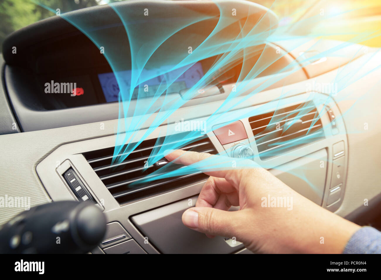 Driver hand tuning air ventilation grille, fresh air is coming out Stock  Photo - Alamy