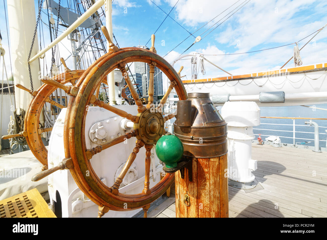 Beautiful wooden steering wheel on a big sailing ship Stock Photo Alamy