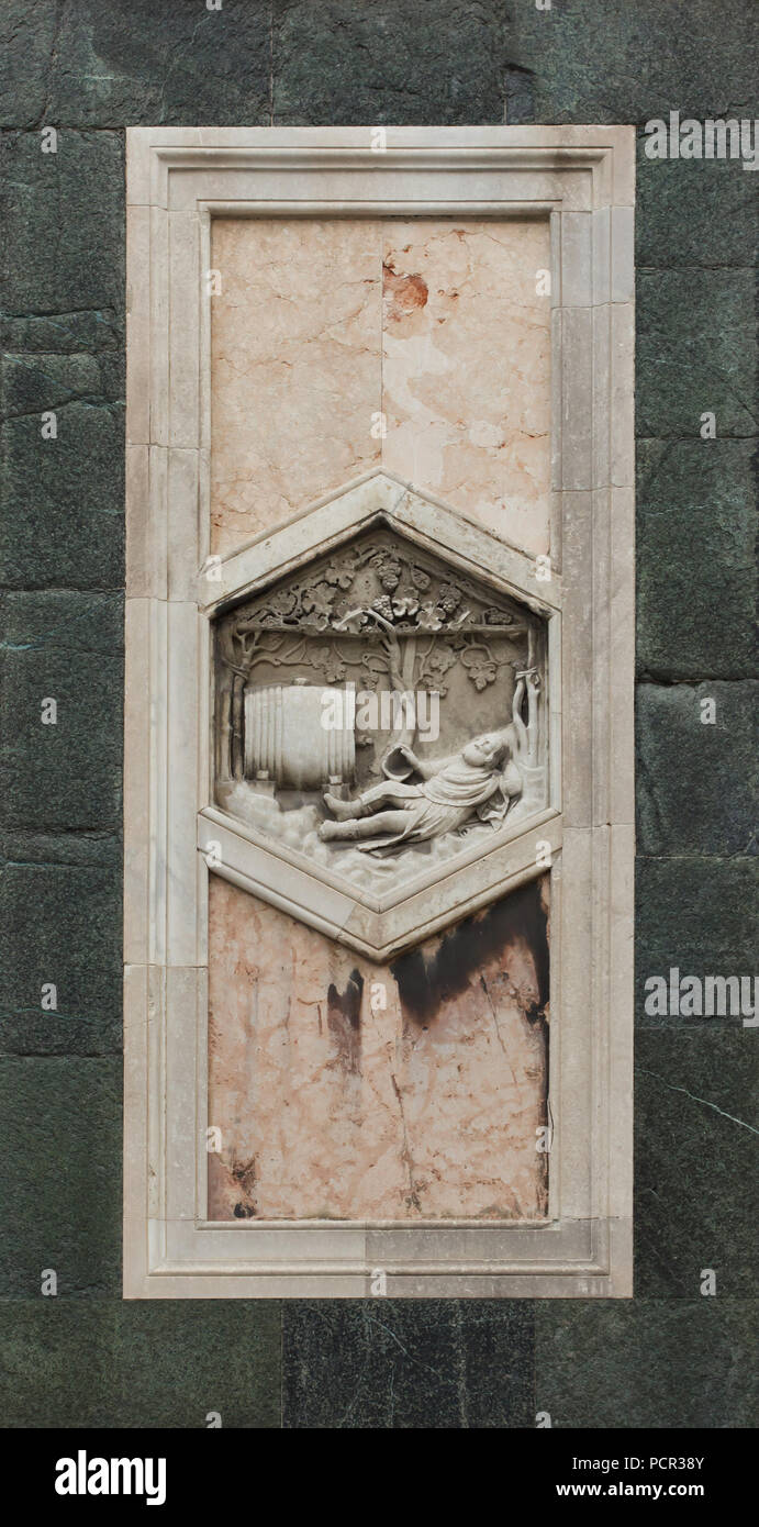 Drunkenness of Noah as personification of the begging of wine making depicted in the hexagonal relief by Italian Renaissance sculptor Andrea Pisano and assistants (1343-1348) on the Giotto's Campanile (Campanile di Giotto) in Florence, Tuscany, Italy. Stock Photo