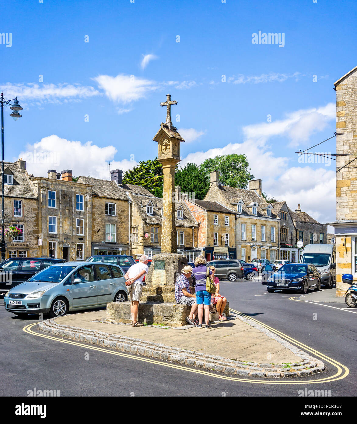 Streets and shops and market cross in historic cotswold town of Stow on the Wold in Gloucestershire, UK on 3 August 2018 Stock Photo