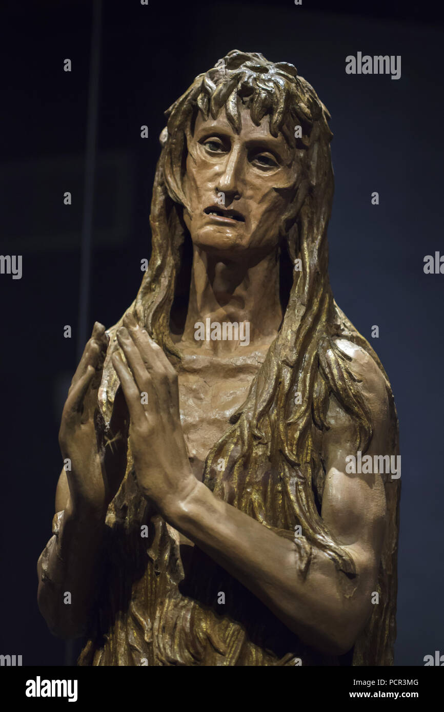 Penitent Magdalene. Wooden sculpture by Italian Renaissance sculptor Donatello (1453-1455) probably commissioned for the Florence Baptistery (Battistero di San Giovanni), now on display in the Museo dell'Opera del Duomo (Museum of the Works of the Florence Cathedral) in Florence, Tuscany, Italy. Stock Photo