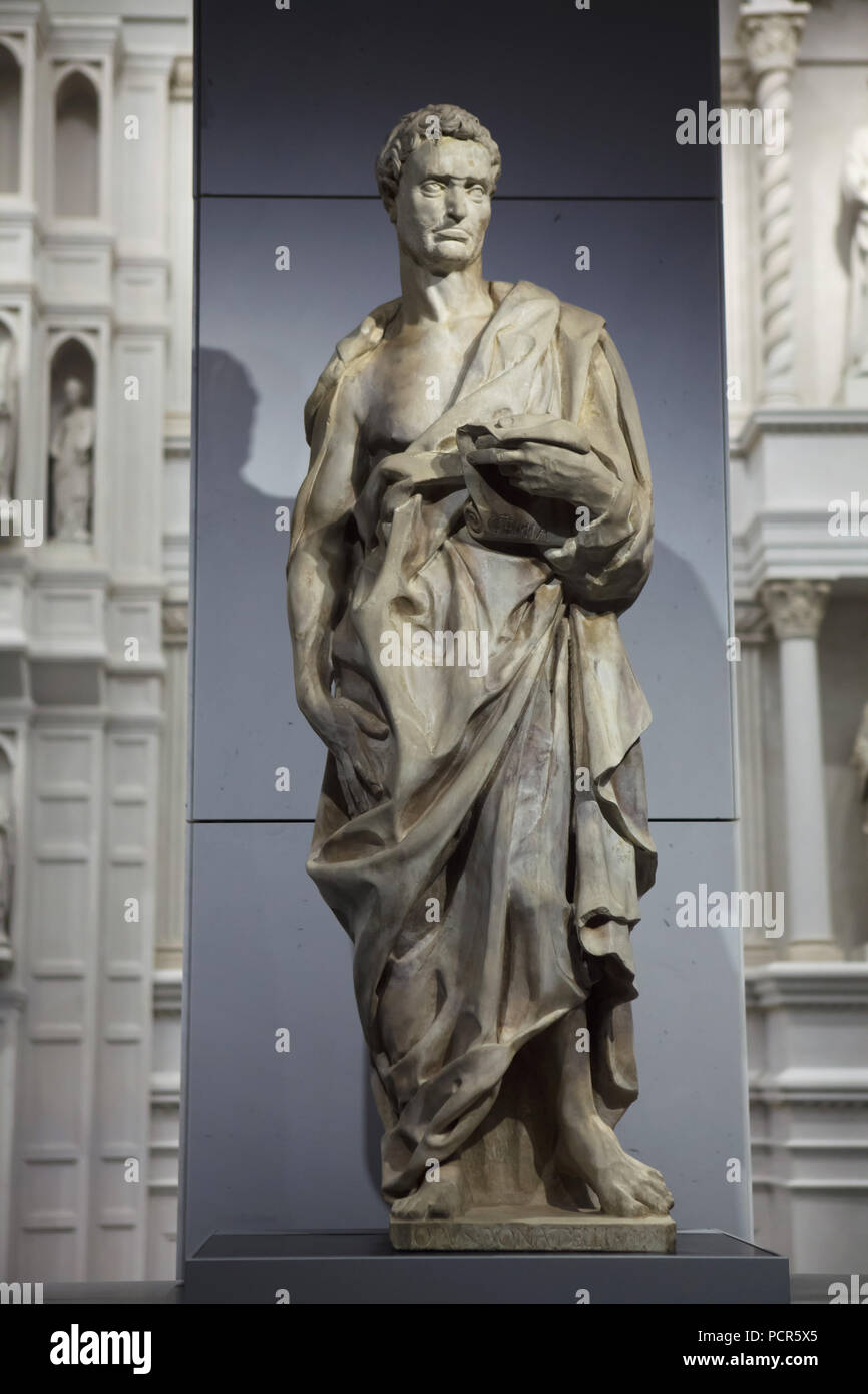 Jeremiah the Prophet. Marble statue by Italian Renaissance sculptor Donatello (1427-1436) from the west facade of the Florence Cathedral (Cattedrale di Santa Maria del Fiore), now on display in the Museo dell'Opera del Duomo (Museum of the Works of the Florence Cathedral) in Florence, Tuscany, Italy. Stock Photo