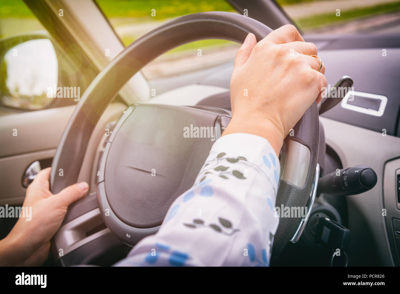 Hand holding steering wheel hi-res stock photography and images - Alamy