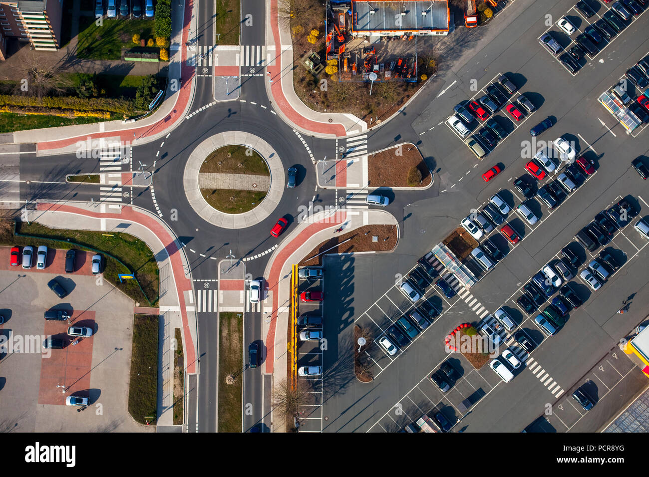 new roundabout on the Bochumer Strasse opposite Hornbach, pedestrian crossings, parking lot, bicycle markings, lane markings, Herne, Ruhr area, North Rhine-Westphalia, Germany Stock Photo