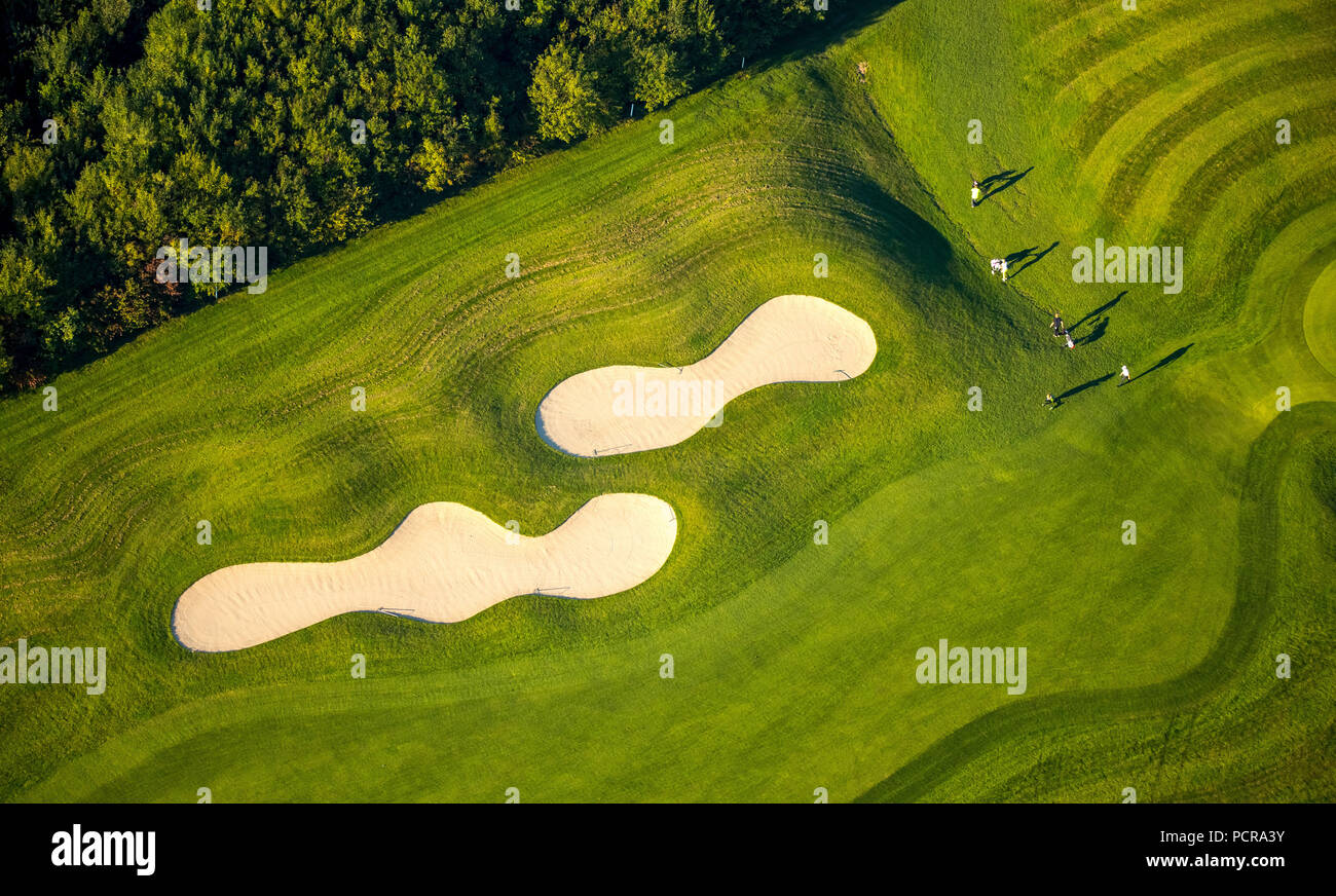 Bunker with golfers and green, Golf & More Duisburg, Duisburg Huckingen, golf course Duisburg, Duisburg, Ruhr area, North Rhine-Westphalia, Germany Stock Photo