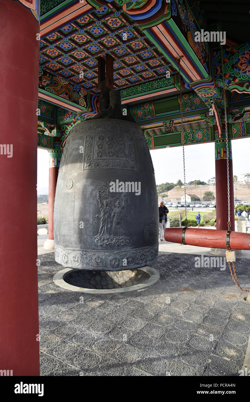 The intricate detail of the Korean Bell of Friendship and its enclosing