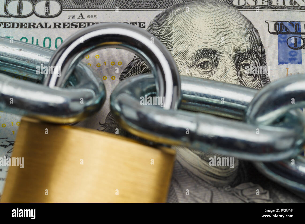 Close Up of Money With Lock and Chain. Stock Photo