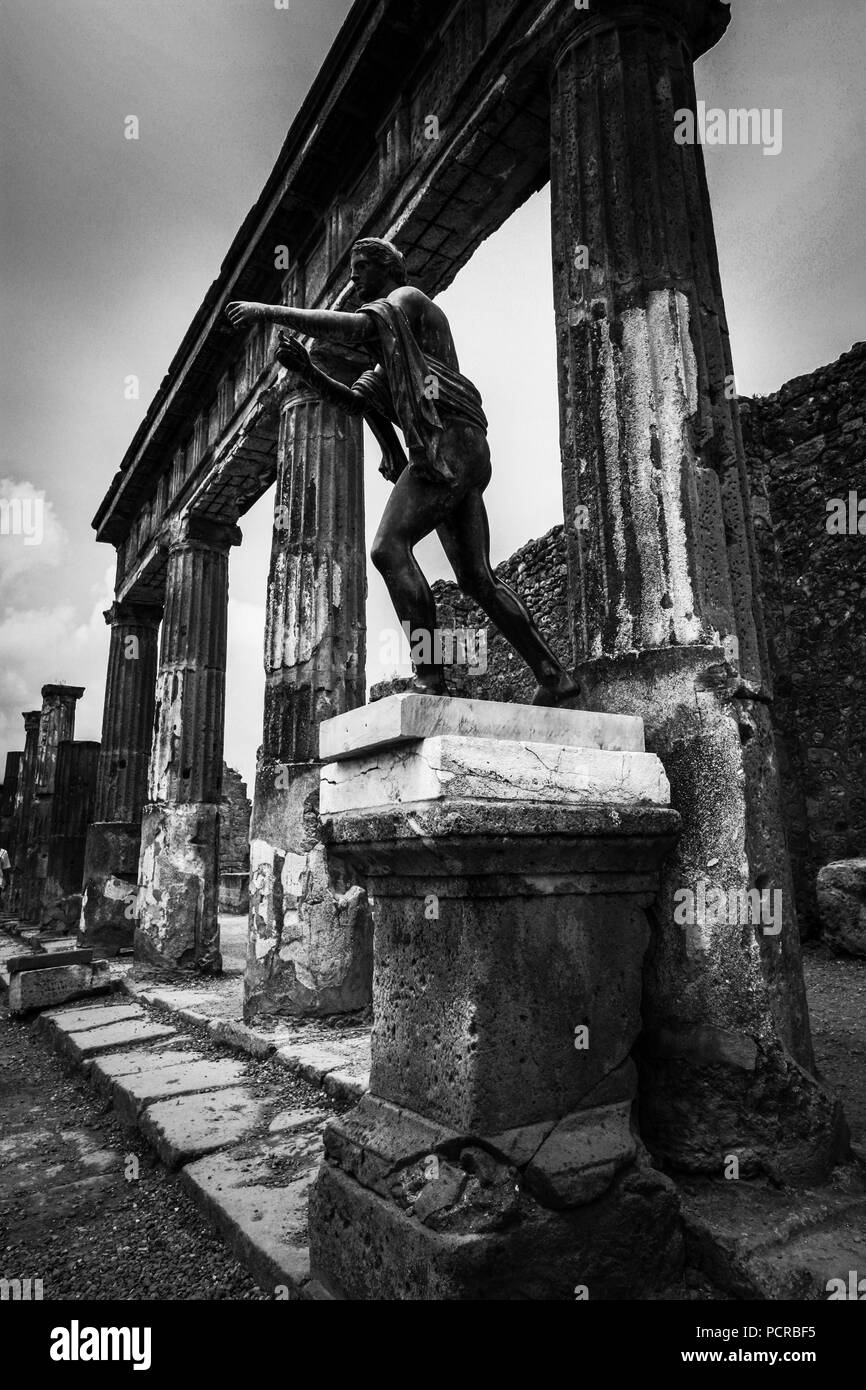 Bronze statue at the Forum in the ruins of the ancient city of Pompeii