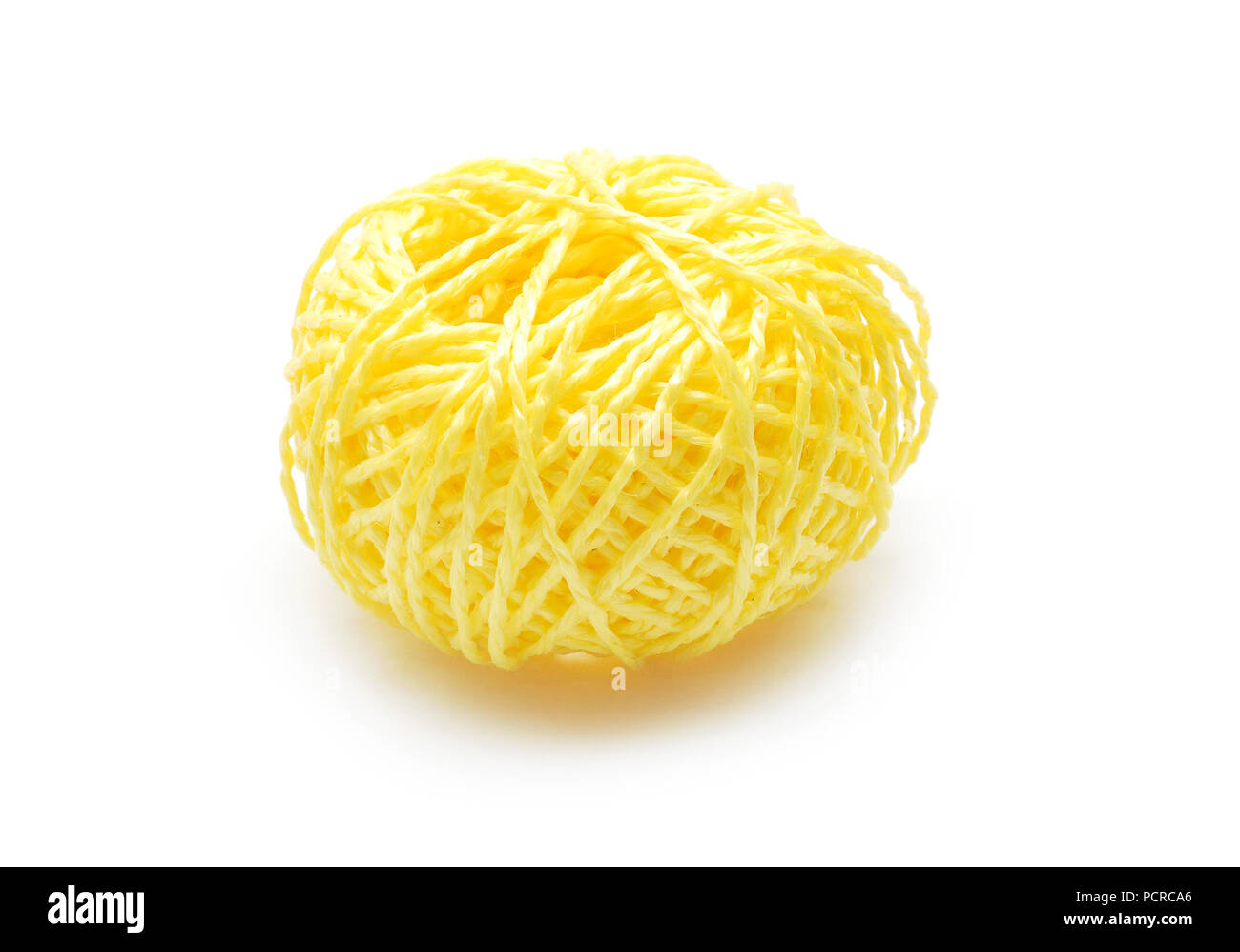 reel of yellow string isolated on white Stock Photo - Alamy