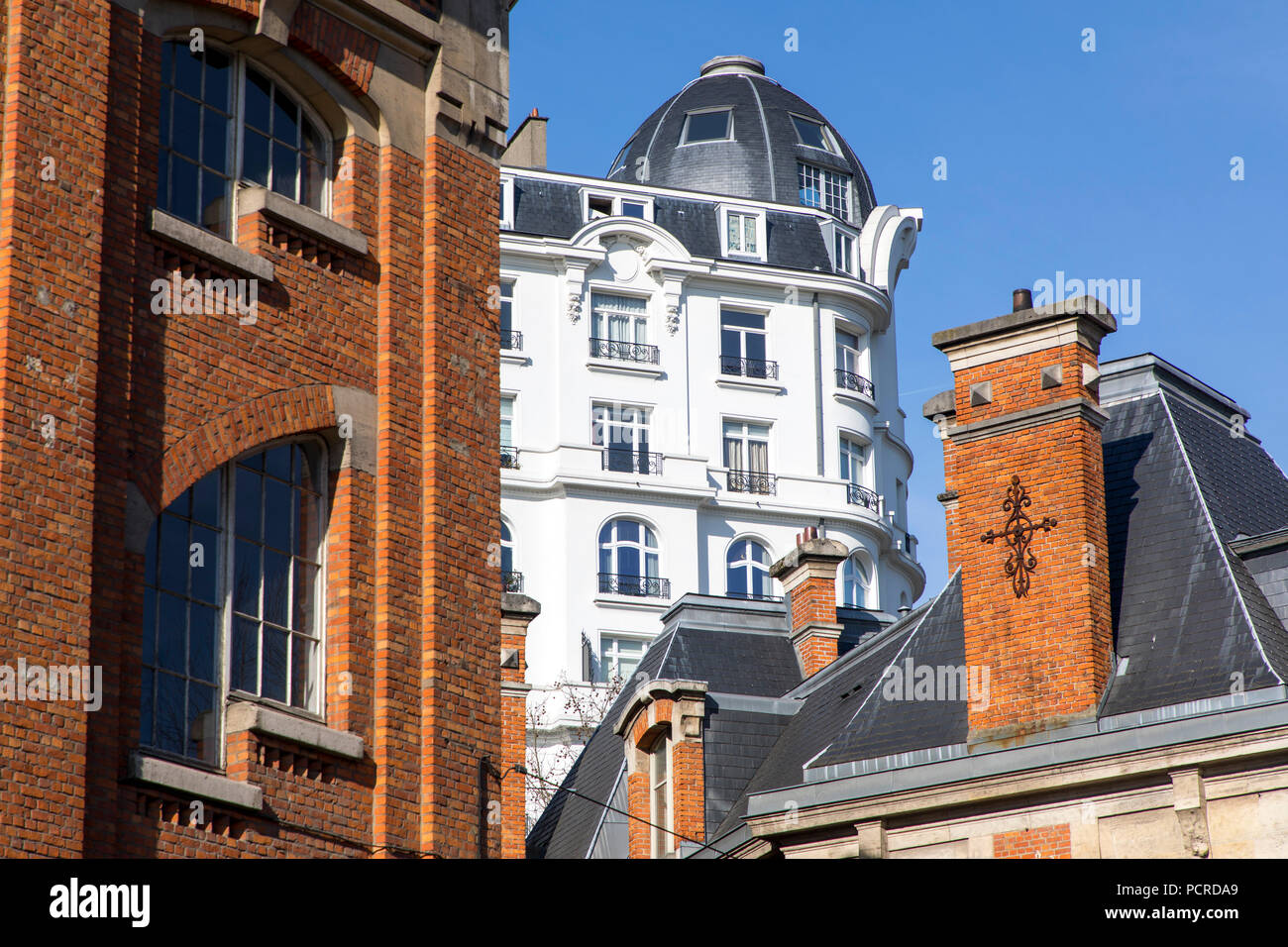Brussels, downtown, different architecture styles at Square Sainctelette, Stock Photo