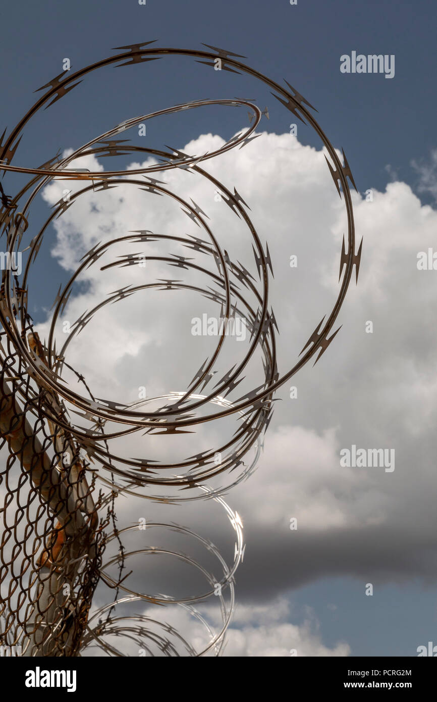 Detroit, Michigan - Razor wire on an industrial building. Stock Photo