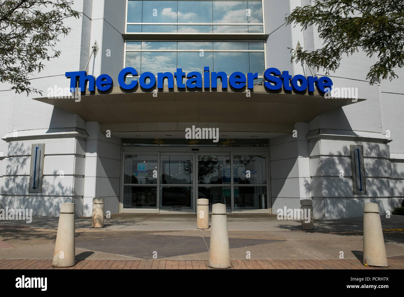 A logo sign outside of a The Container Store retail store in Broomfield