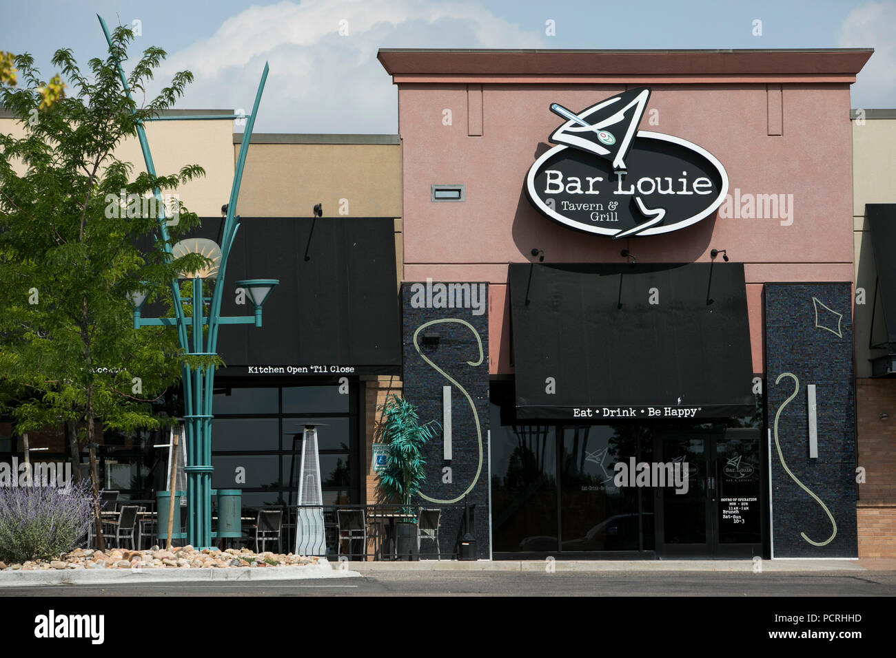A logo sign outside of a Bar Louie restaurant location in Westminster, Colorado, on July 23, 2018. Stock Photo