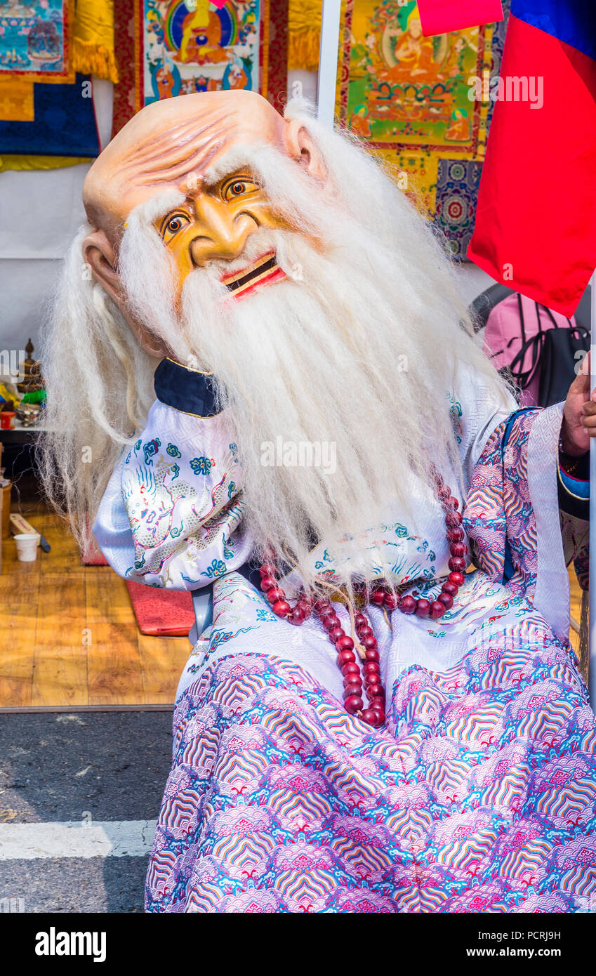 Mongolian man with traditional costum of Sagaan Ubgen during Lotus