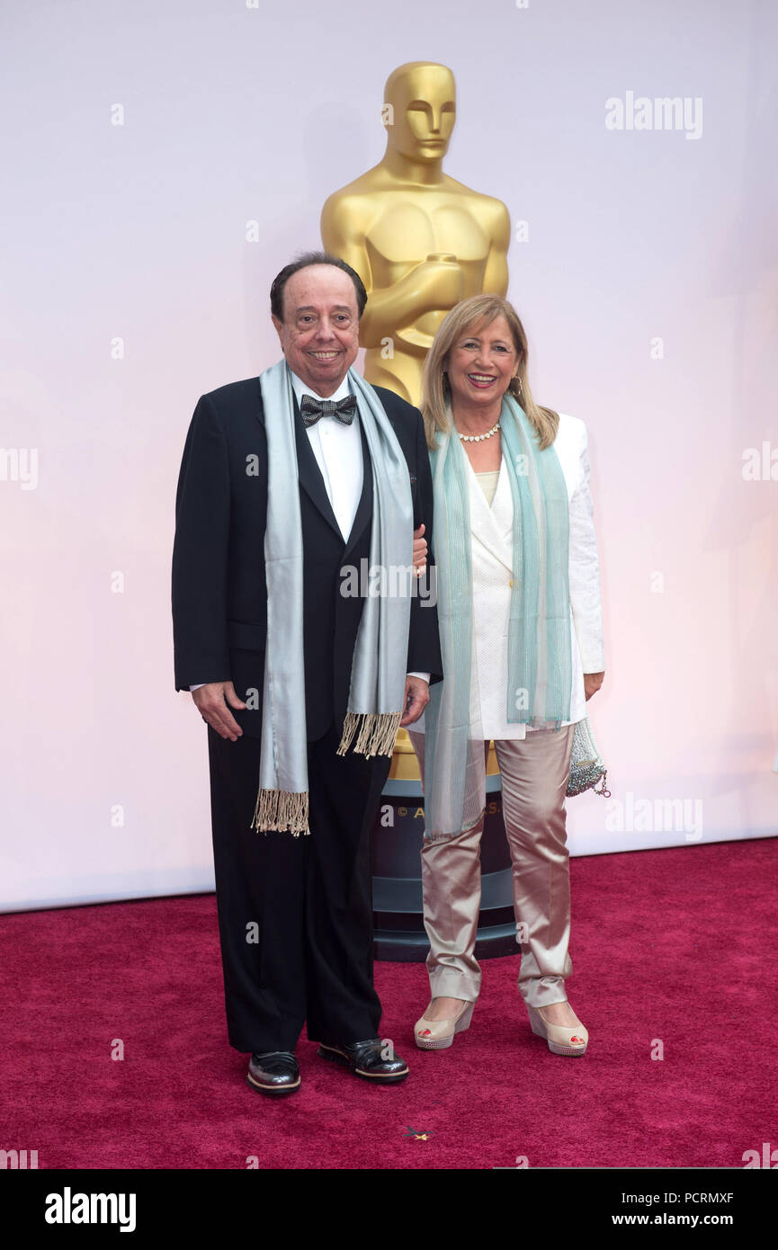 HOLLYWOOD, CA - FEBRUARY 22:  Sergio Mendes and Gracinha Leporace attendst the 87th Annual Academy Awards at Hollywood & Highland Center on February 22, 2015 in Hollywood, California.   People:  Sergio Mendes and Gracinha Leporace Stock Photo