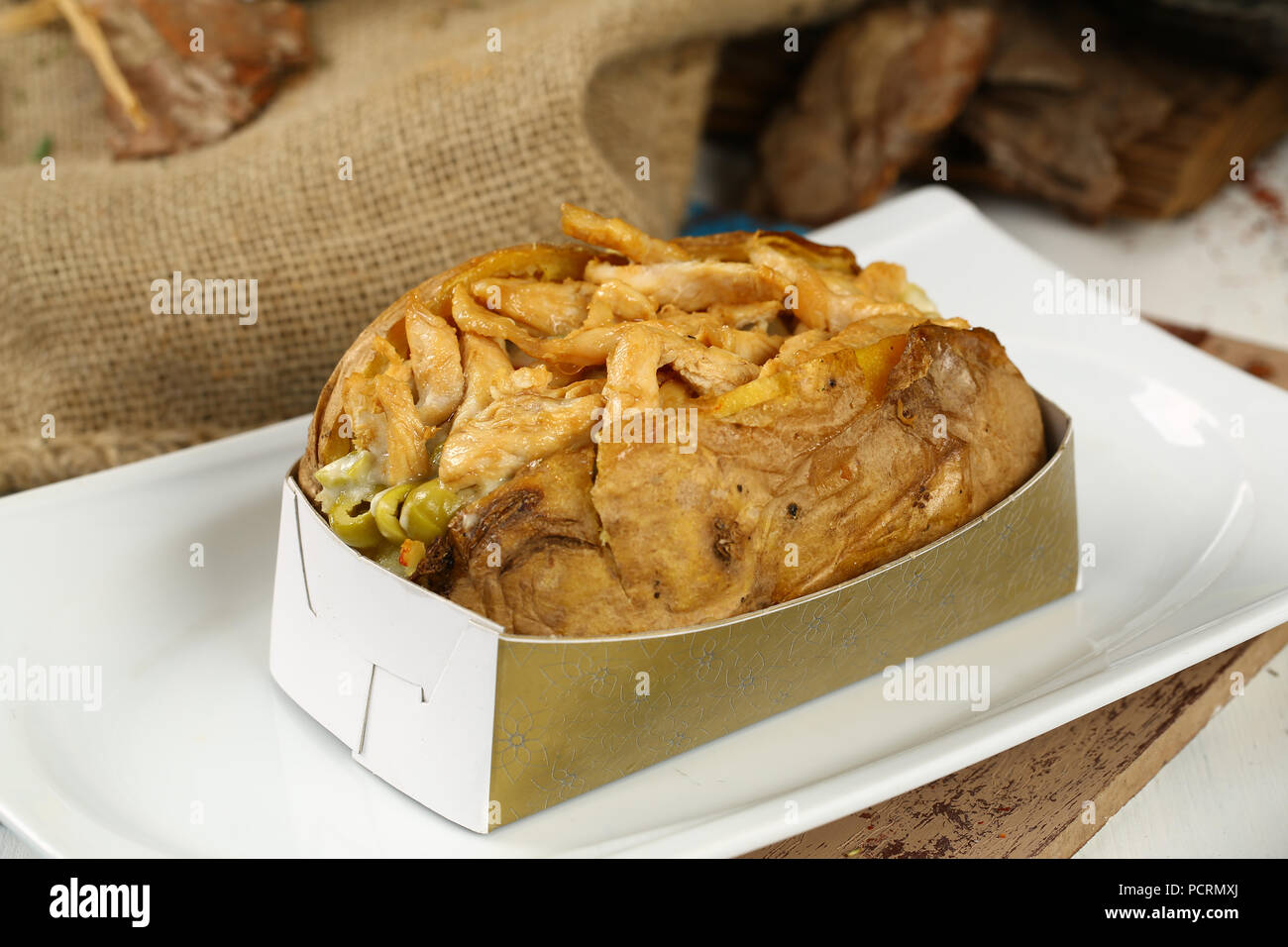 Kumpir / Turkish Baked potato with chicken meat Stock Photo