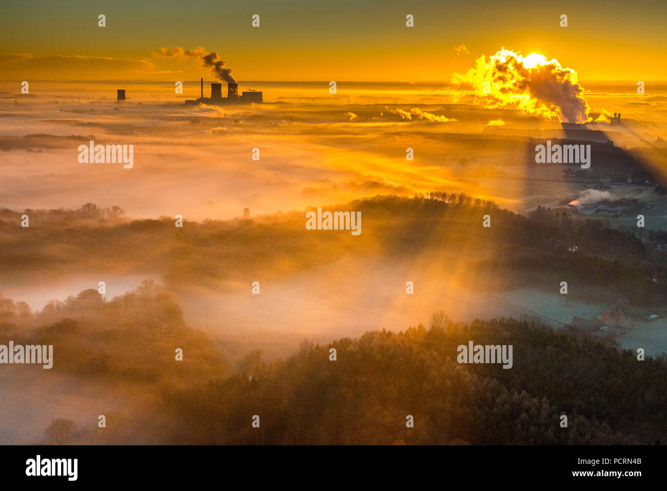 morning mist over the Lippepe, Lippe marsh, Trianel power plant, GUD gas turbine power plant, Westphalia power plant RWE power, coal power station, sunrise over Hamm, aerial view of Hamm, Ruhr area Stock Photo