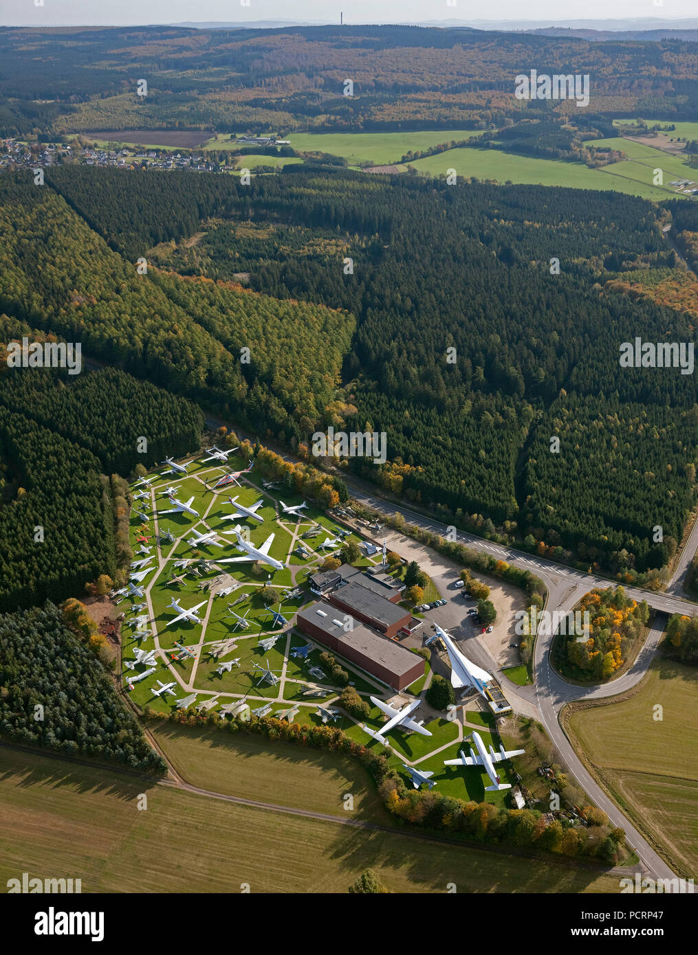 Aerial photo, Flight exhibition L. + P. Junior Private Aviation Museum, Antonow An-26, Concorde, Messerschmitt Bf 108, F-104 Starfighter, McDonnell F-4 Phantom, MiG-15, MiG-17, MiG-21, MiG-23, Vickers Viscount, Lockheed Super Constellation, Junkers Ju 52 / 3m, Aunt Ju, Heinkel 111, Malborn, Hunsrückhöhenstraße, Rhineland-Palatinate, Germany, Europe Stock Photo