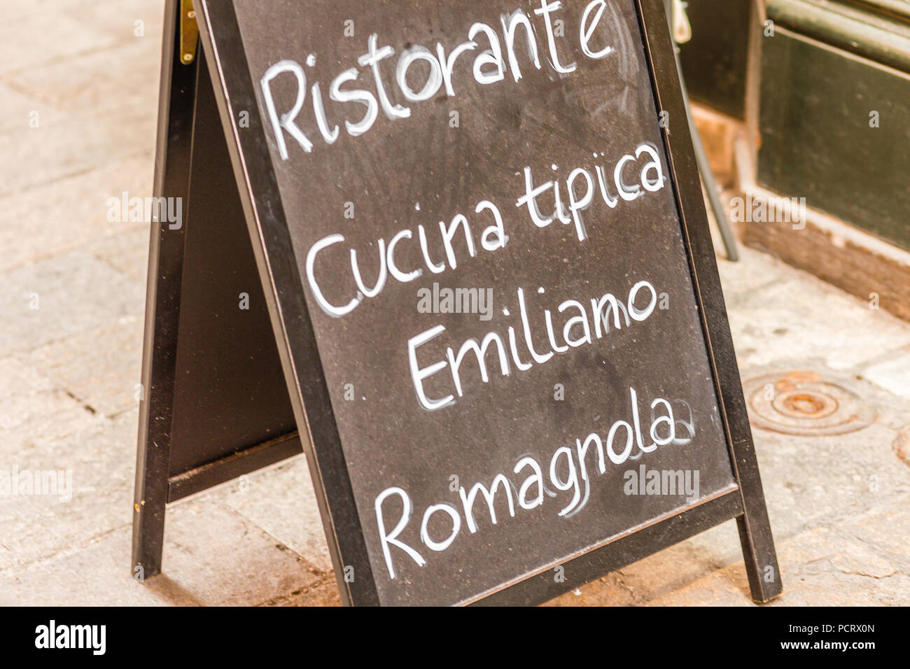 restaurant advertising board with Italian sentence meaning Restaurant