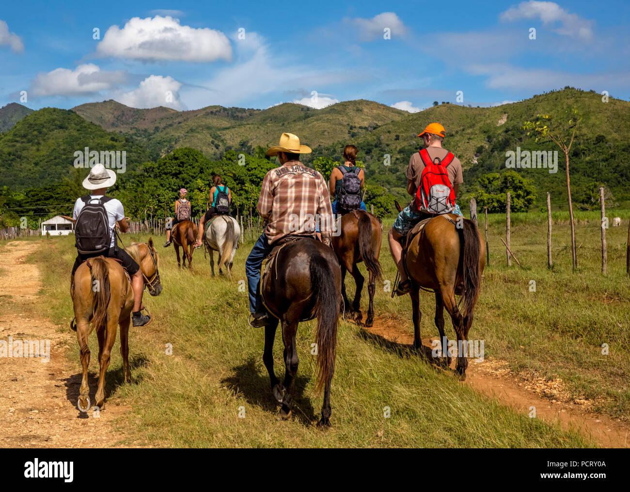 Tourists during an excursion riding in Valle de los Ingenios, Trinidad, Cuba, Sancti Spíritus, Cuba Stock Photo