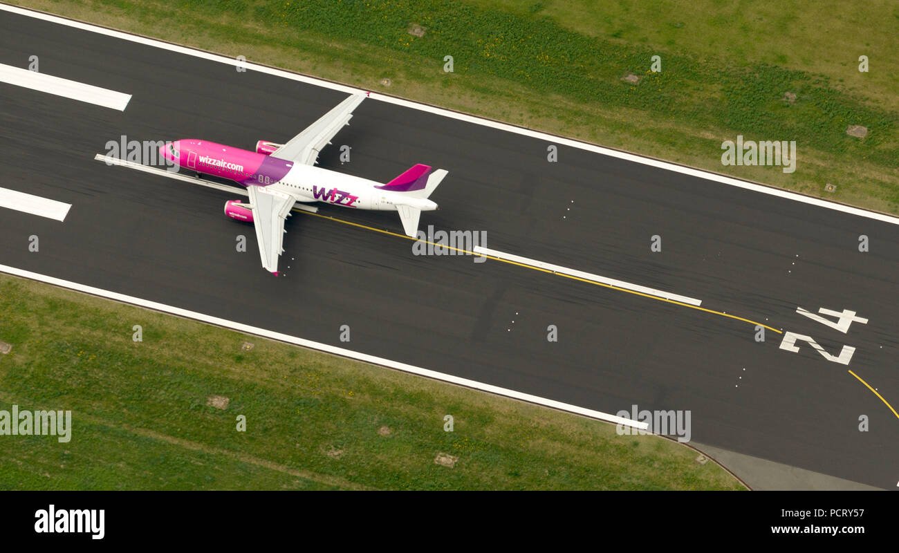 Aerial view, Dortmund Wickede Airport, runway, aircraft takeoff, runway, WIZZ, Holzwickede, Ruhr area, North Rhine-Westphalia, Germany, Europe Stock Photo