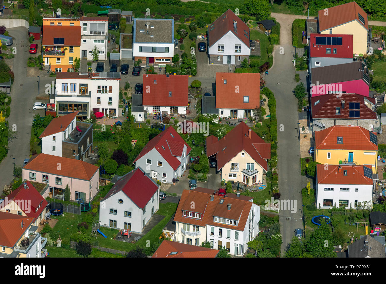 Aerial photo, individual building, Tremoniabogen colourful single-family housing estate, Dortmund, Ruhr area Stock Photo