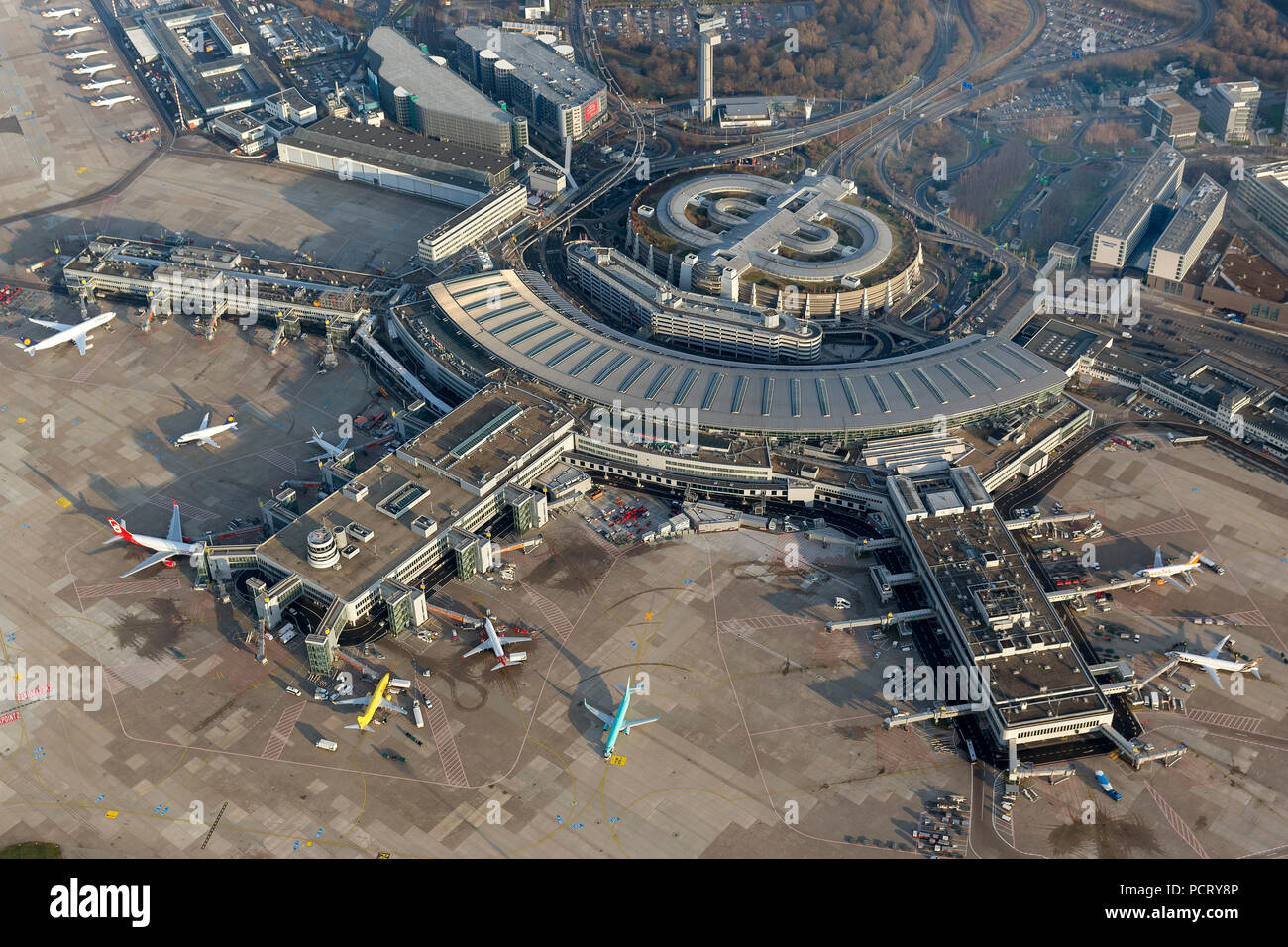 Aerial photo, Düsseldorf Airport, A, B, C Terminals, jet bridges, Airport Hotel, A44 Autobahn (motorway) access, Tower, Europe's tallest control tower, Dusseldorf, Rhineland, North Rhine-Westphalia, Germany, Europe Stock Photo