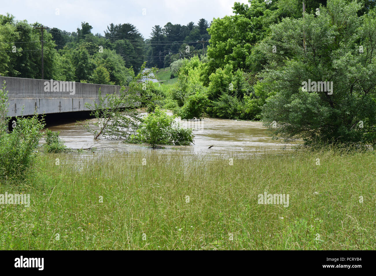 A river flooding in Hendersonville, North Carolina Stock Photo - Alamy
