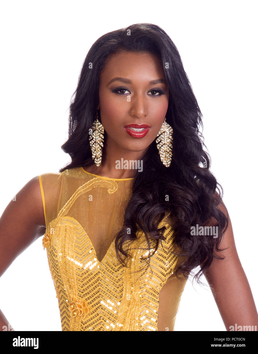 DORAL, FL - JANUARY 23: Christie Desir, Miss Haiti 2014 poses is her  evening gown for The