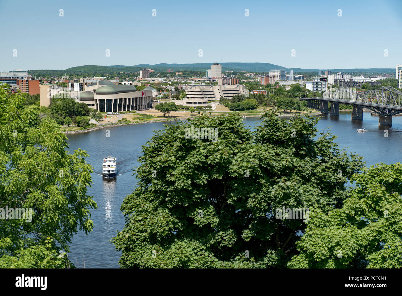 Gatineau, Quebec, Canada.  Looking northwest across Ottawa River in summer at Gatineau and Alexandra Bridge from Parliament Hill in Ottawa, Ontario. Stock Photo