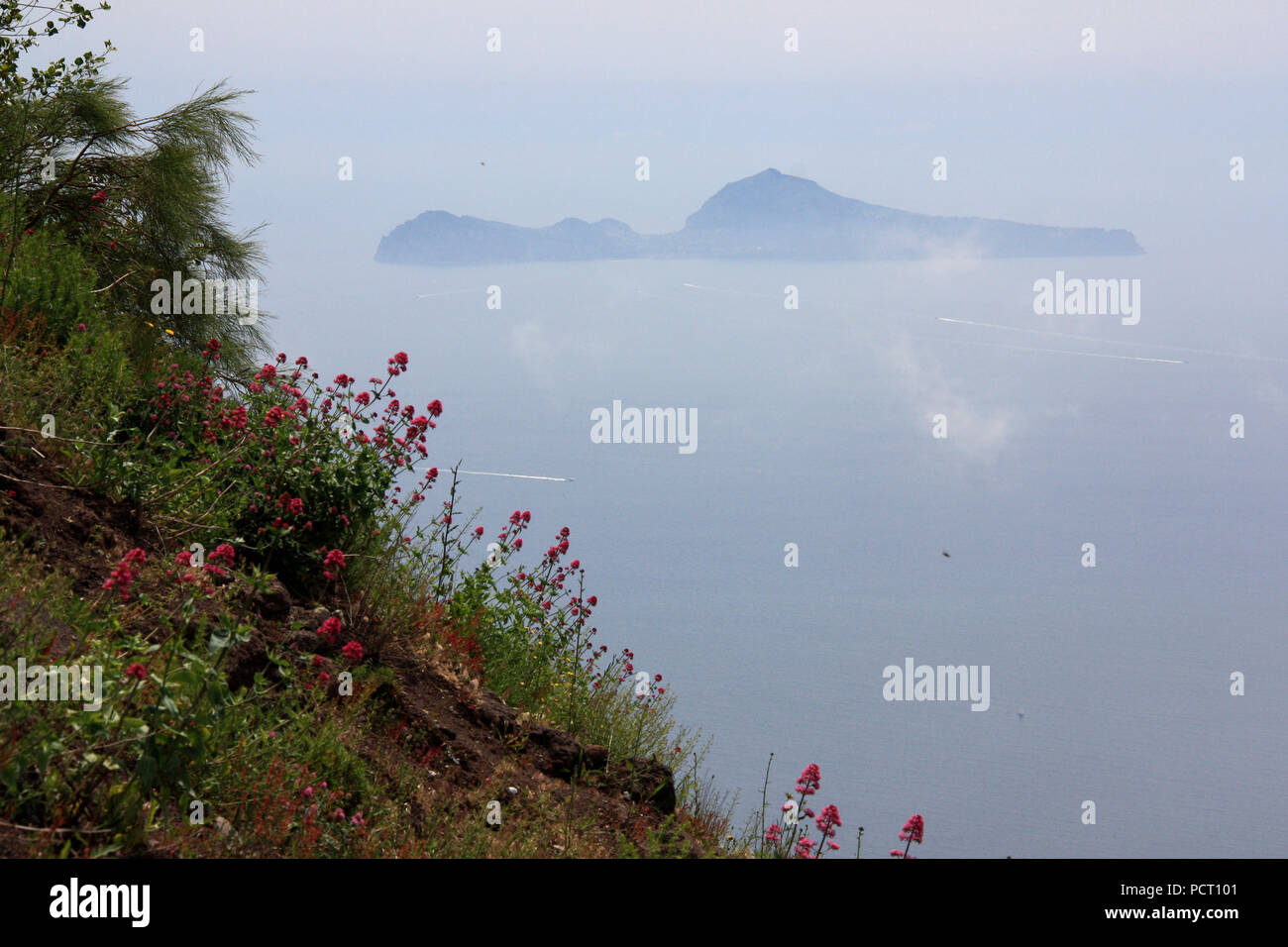 Silhouette of the island Capri in the Tyrrhenian Sea seen from the peak of Mount Vesuvius, Golfo di Napoli, Italy Stock Photo