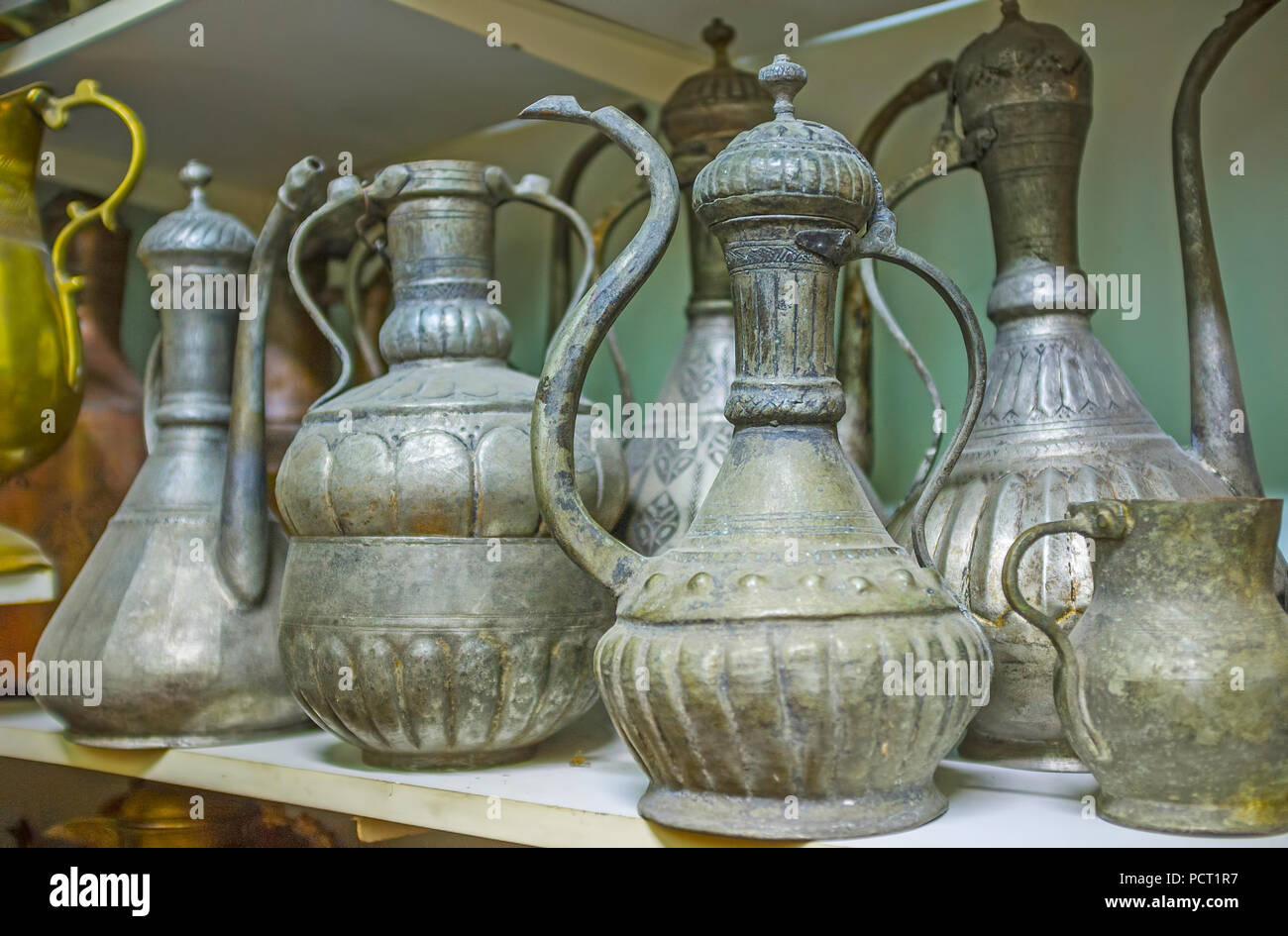 Hand Chased Dallah Coffee Pots In Antique Store Of Old Hand Chased Dallah Coffee Pots In Antique Store Of Old