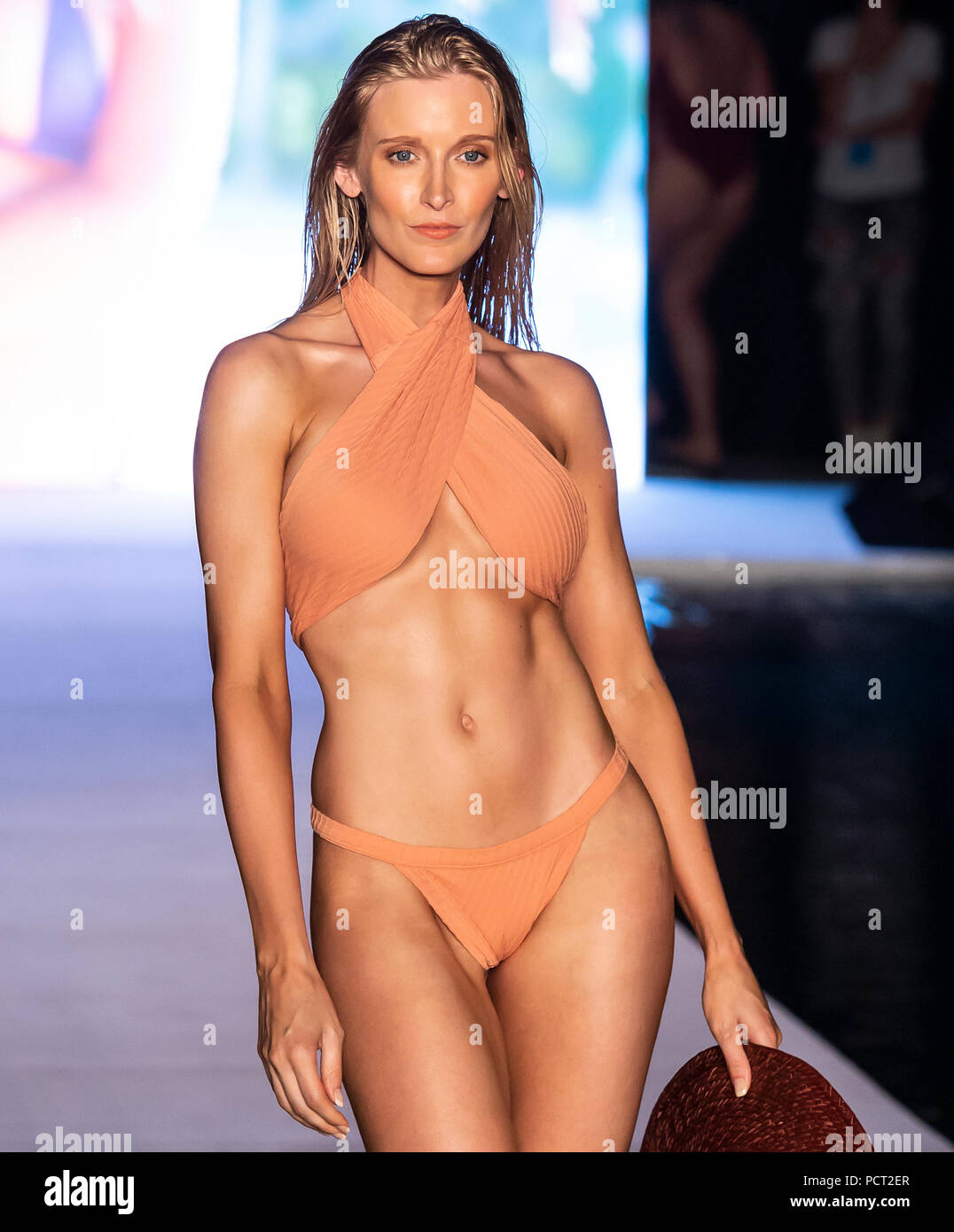 MIAMI BEACH, FL - JULY 15, 2018: A model walks the runway for the 2018  Sports Illustrated Swimsuit show during Miami Swim Week at The W Hotel  South Be Stock Photo - Alamy