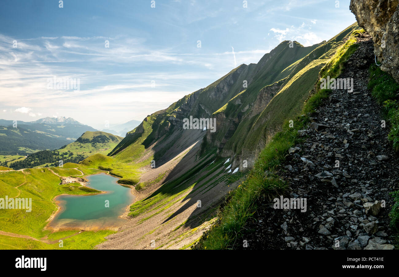 scary hiking path with beautiful scenery view over the swiss alps and ...