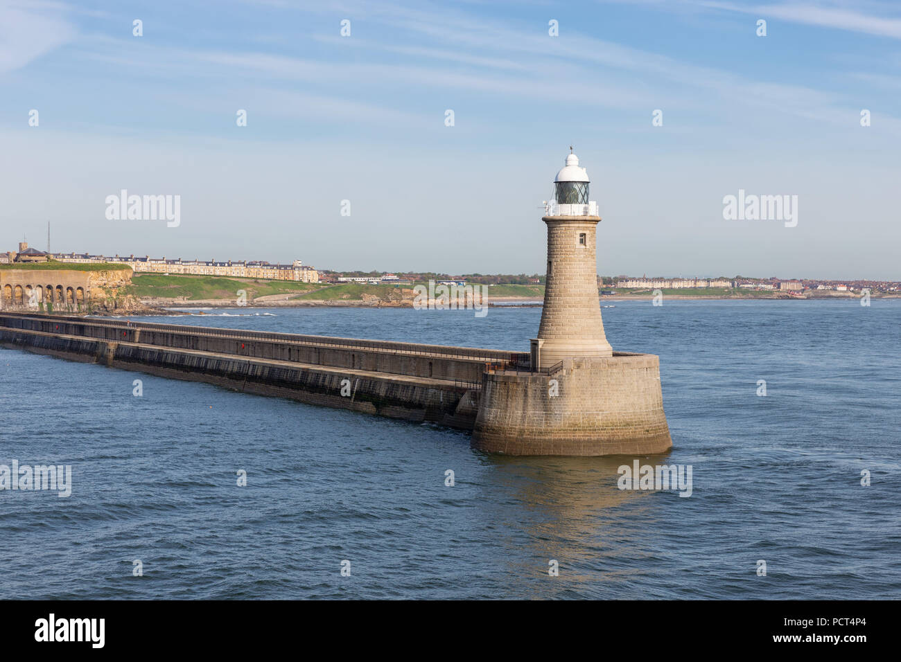 Lighthouse at end of breakwater harbor Newcastle at river Tyne Stock Photo