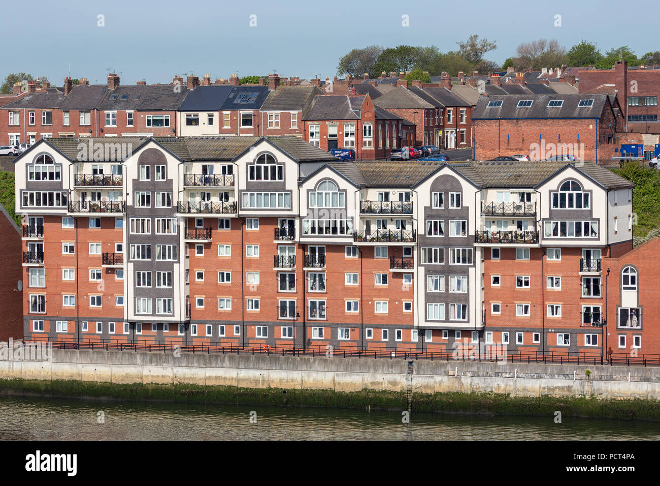 Modern and new houses along river Tyne in Newcastle, England Stock Photo