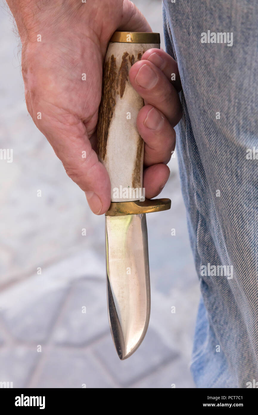 Man Holding Handcrafted Hunting Knife, USA Stock Photo