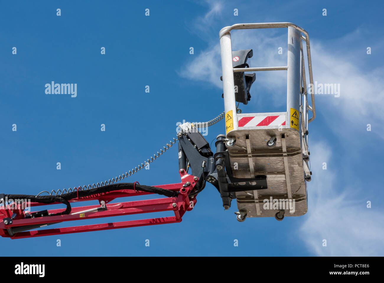 cherry picker or mobile elevated work platform basket or access platform  for reaching heights and working at height on building sites and  construction Stock Photo - Alamy