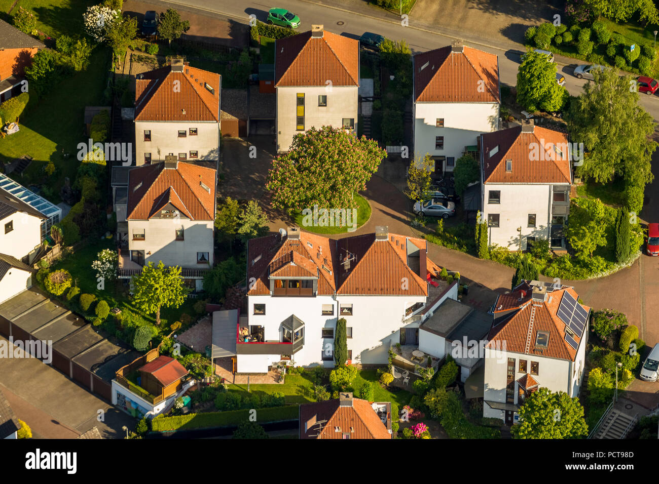 Multi-family houses with red tile roofs at Volmarstein, Wetter on the Ruhr River, Ruhr area Stock Photo
