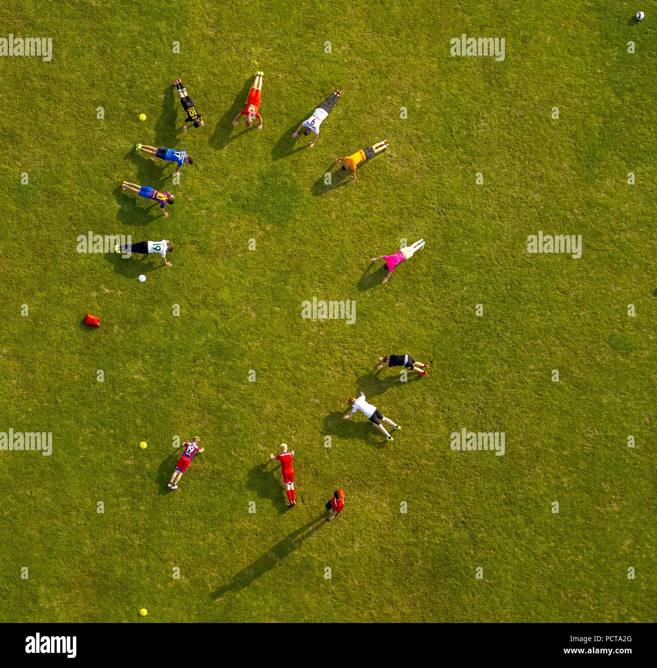 Aerial photo, press-ups, stamina training, football team, aerial photo, training at the sports complex at Sommerkamp, ??Meschede, Sauerland, North Rhine-Westphalia, Germany Stock Photo