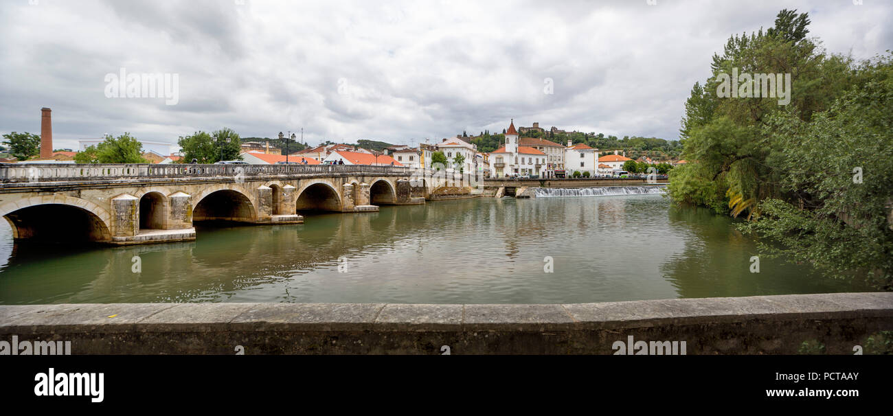 Renaissance bridge Ponte Velha over the Nabao near the old town of Tomar with the Convento de Cristo in the background, Tomar, Santarém district, Portugal, Europe Stock Photo