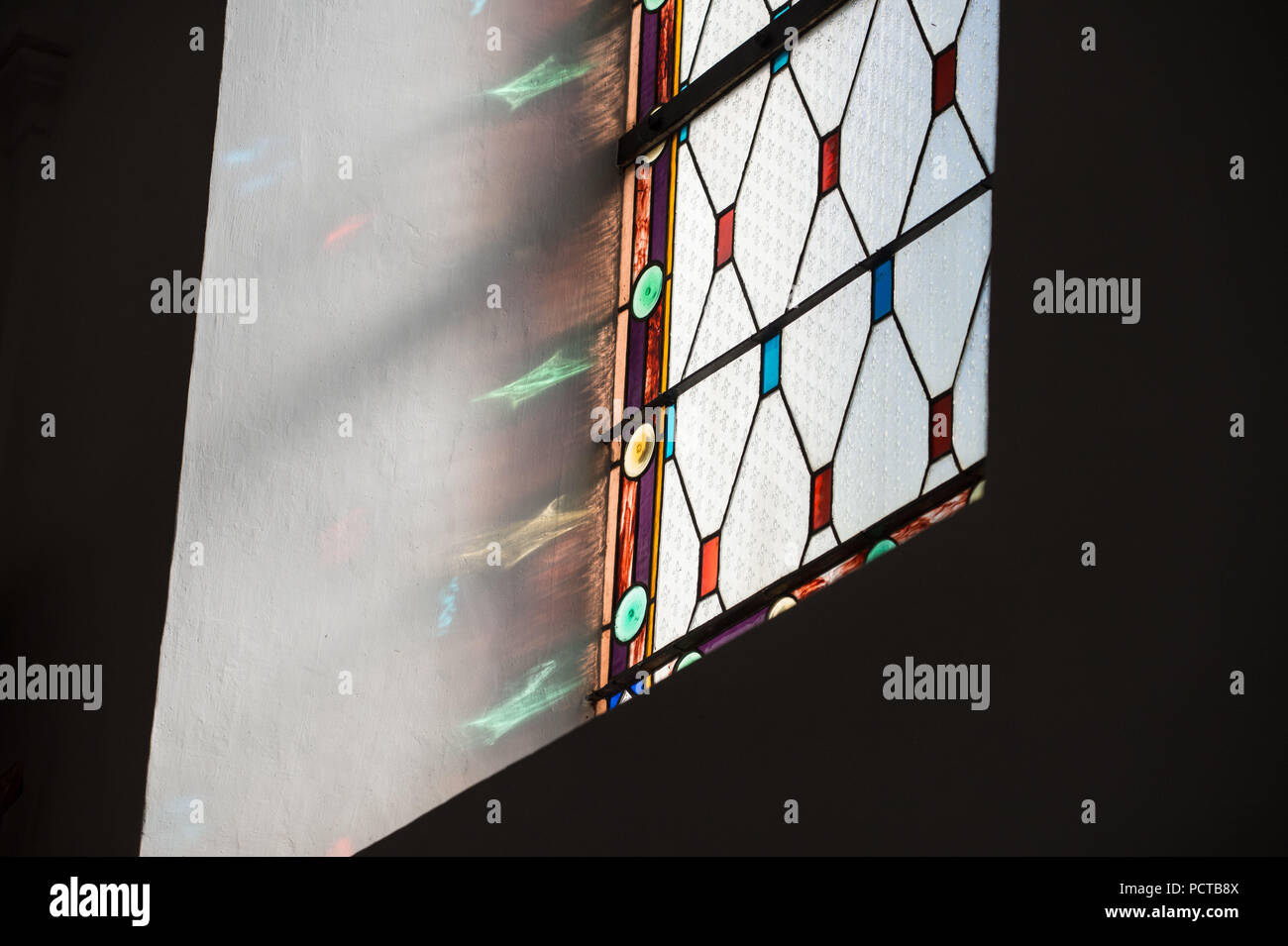 Church, indoors, detail, stained glass window, lights, reflection Stock