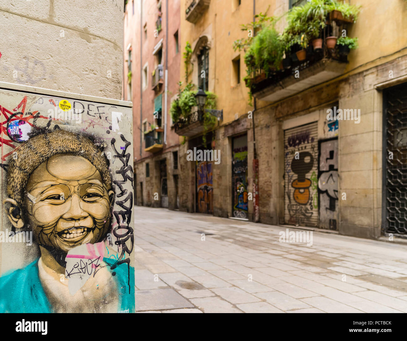 Mural and graffiti in the old town of Barcelona Stock Photo