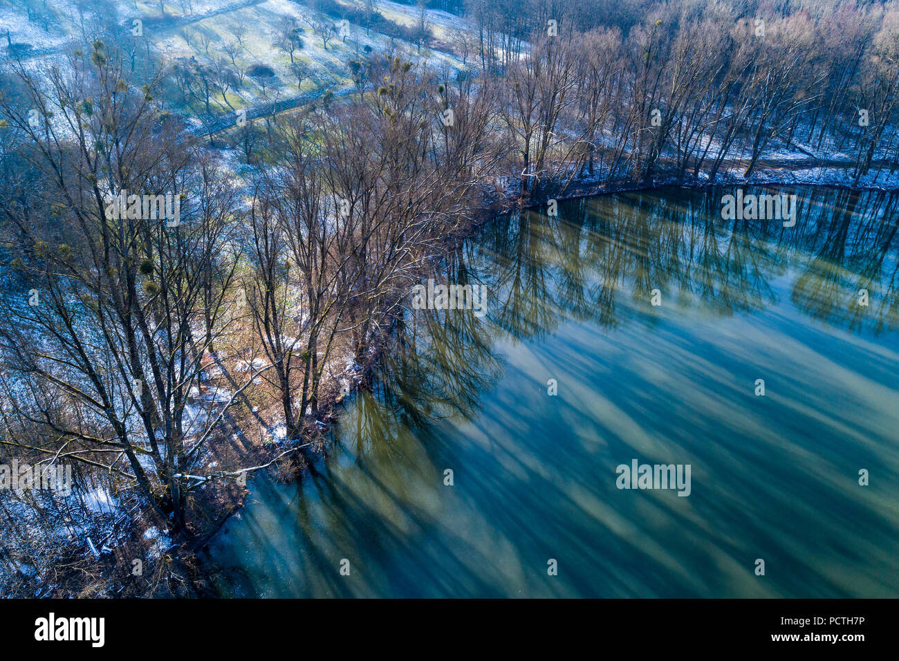 Aerial view, spring, snow remains at the reservoir Winterbach, Baden-Wuerttemberg, Germany Stock Photo