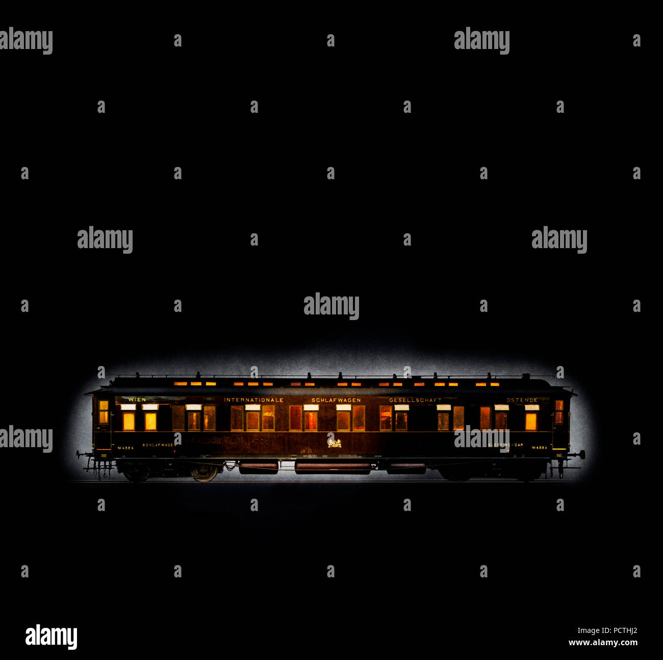 Railway wagon, teak, illuminated from inside and outside, studio shot ', [M], retouched, RailArt Stock Photo