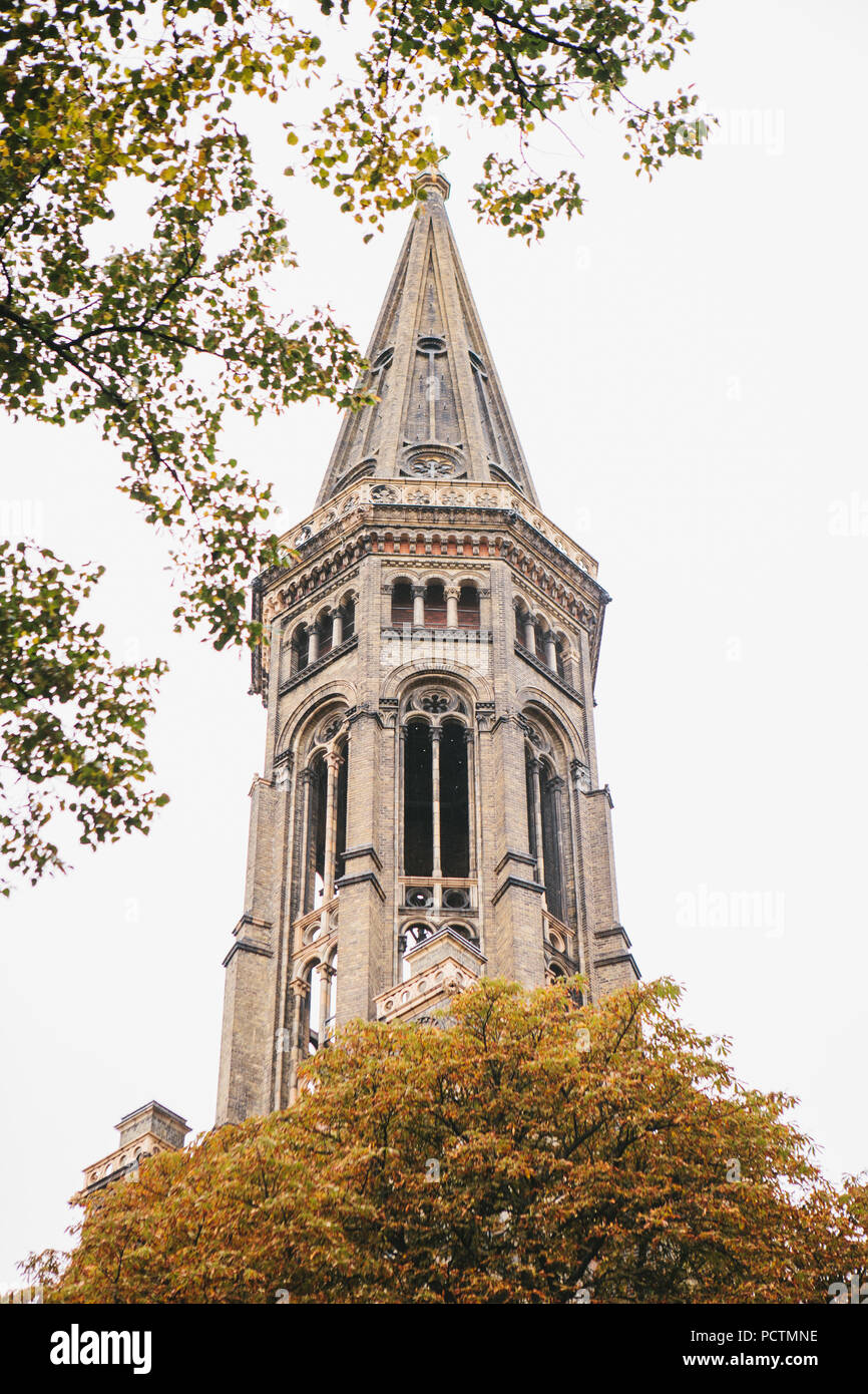 The church in Berlin in Germany in the autumn among the trees. A religious building. Stock Photo