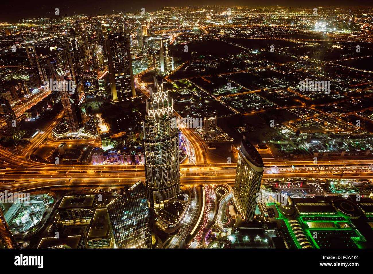 Aerial view of downtown Dubai and skyscrapers at night from the top of Burj Khalifa Stock Photo