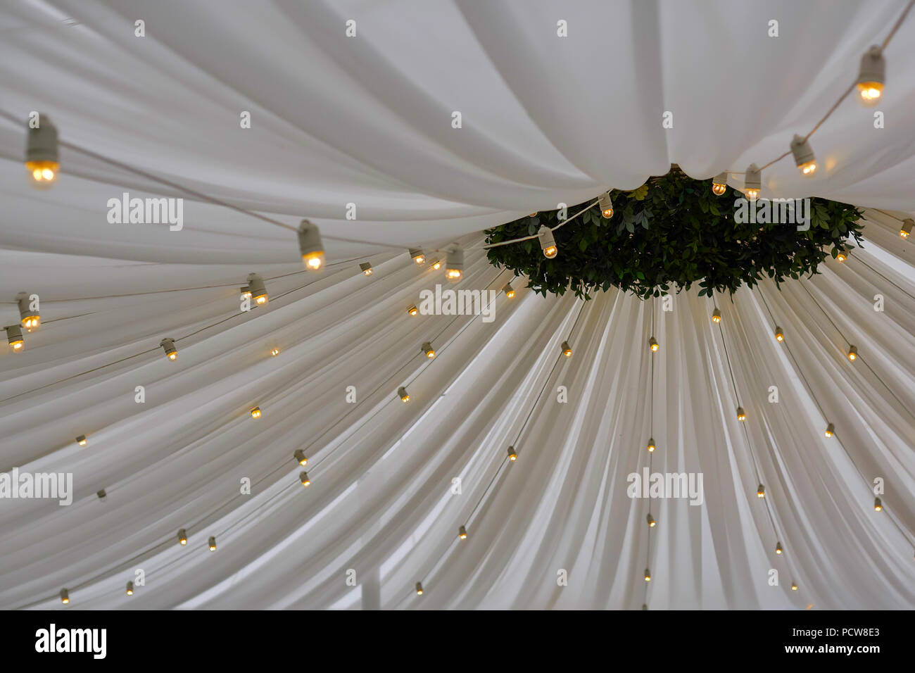 Decorated Tent With Bulb Garland Wedding Setup White Paper