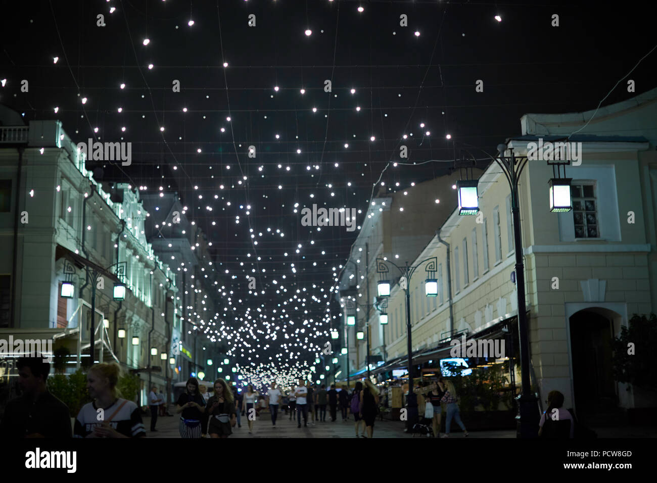Moscow, Russia - April 2018: Arbat street decorated with garlands Russia Stock Photo